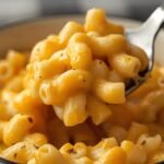 A close-up of a bowl of mac and cheese with