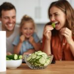 A happy family enjoying a fresh cucumber salad, with a