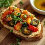 A slice of toasted sourdough bread topped with a generous